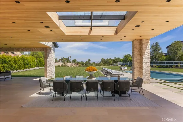 a view of an outdoor space with furniture