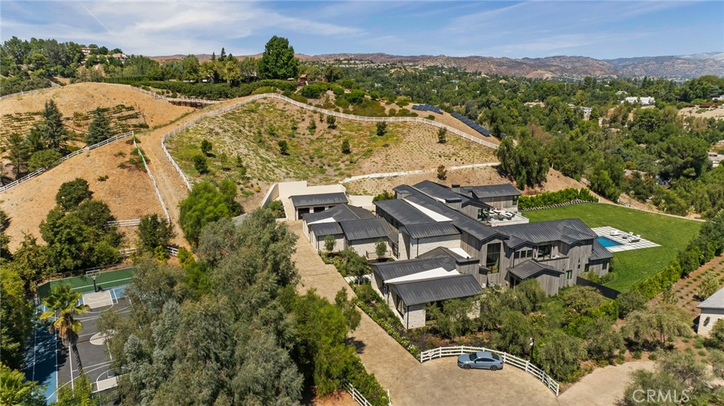 24255 Bridle Trail Road Hidden Hills, CA 91302 - Photo 47 of 52 an aerial view of a house with a lake