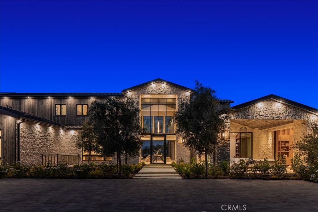 24255 Bridle Trail Road Hidden Hills, CA 91302 - Photo 52 of 52 a view of a house with a yard