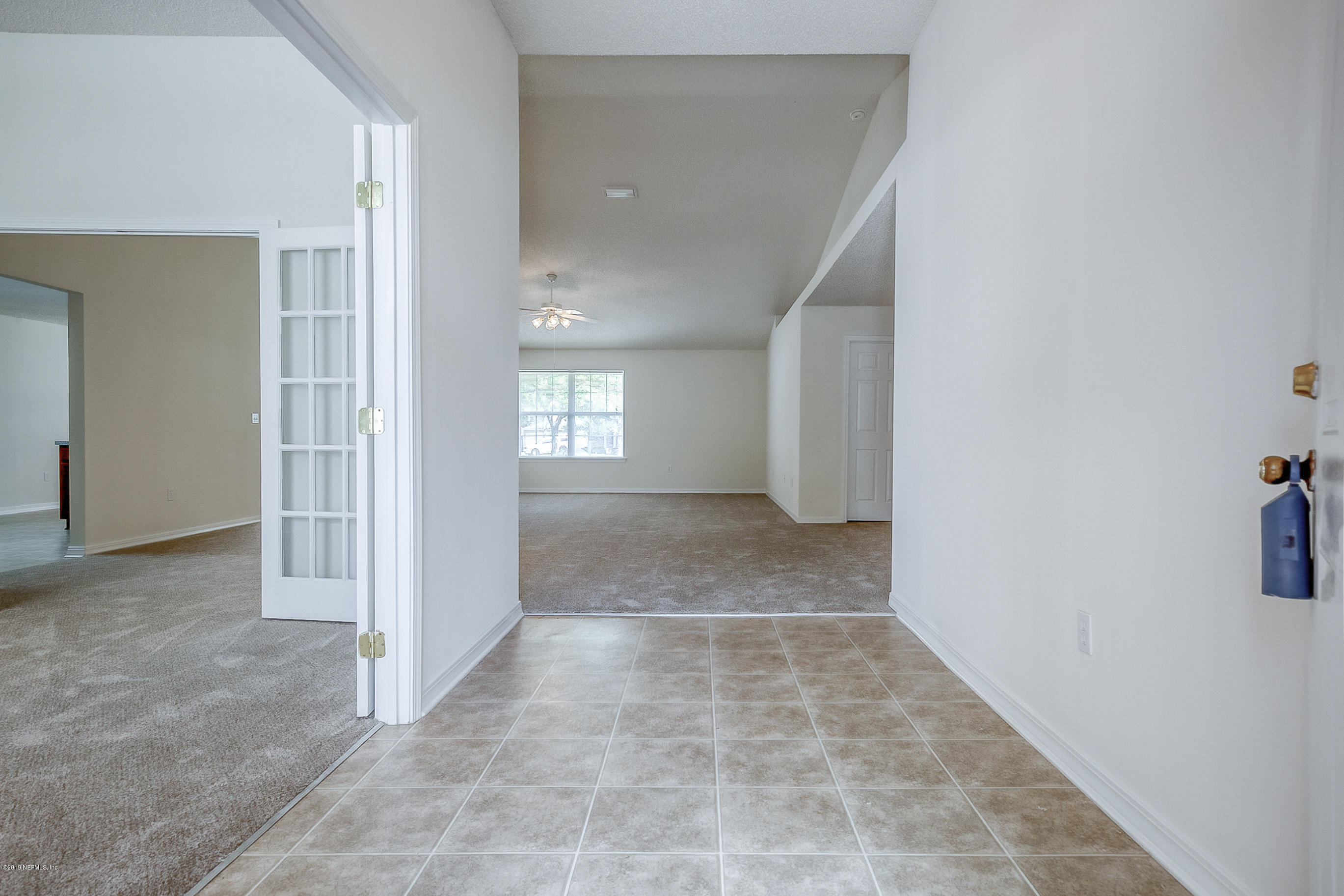 2633 Springwillow Drive Jacksonville, FL 32221 - Photo 3 of 33 a view of hallway with windows