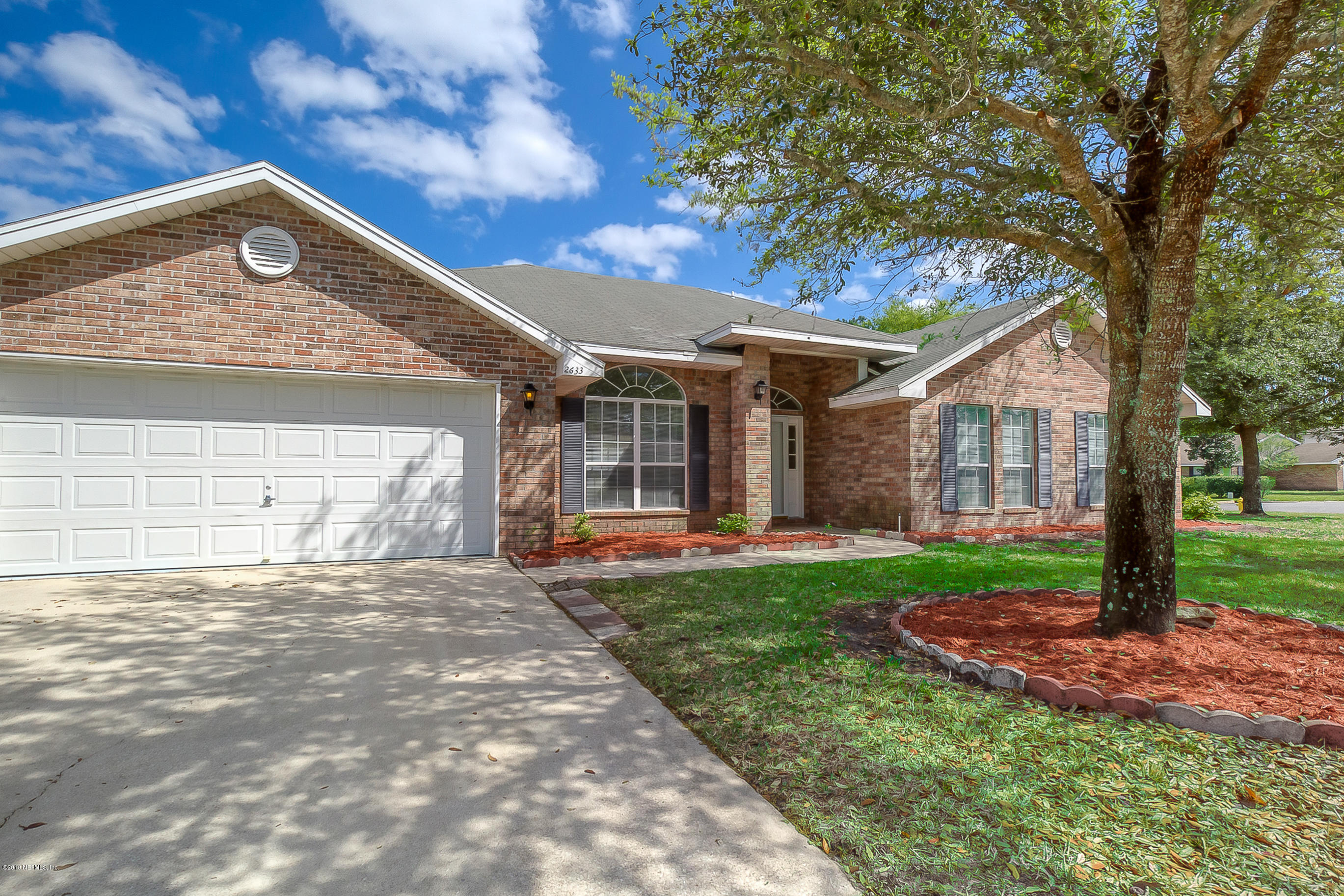2633 Springwillow Drive Jacksonville, FL 32221 - Photo 33 of 33 a front view of a house with garden