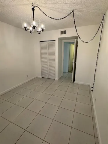 a view of a livingroom with a chandelier