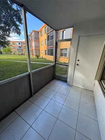a view of a bathroom with sink and bathtub