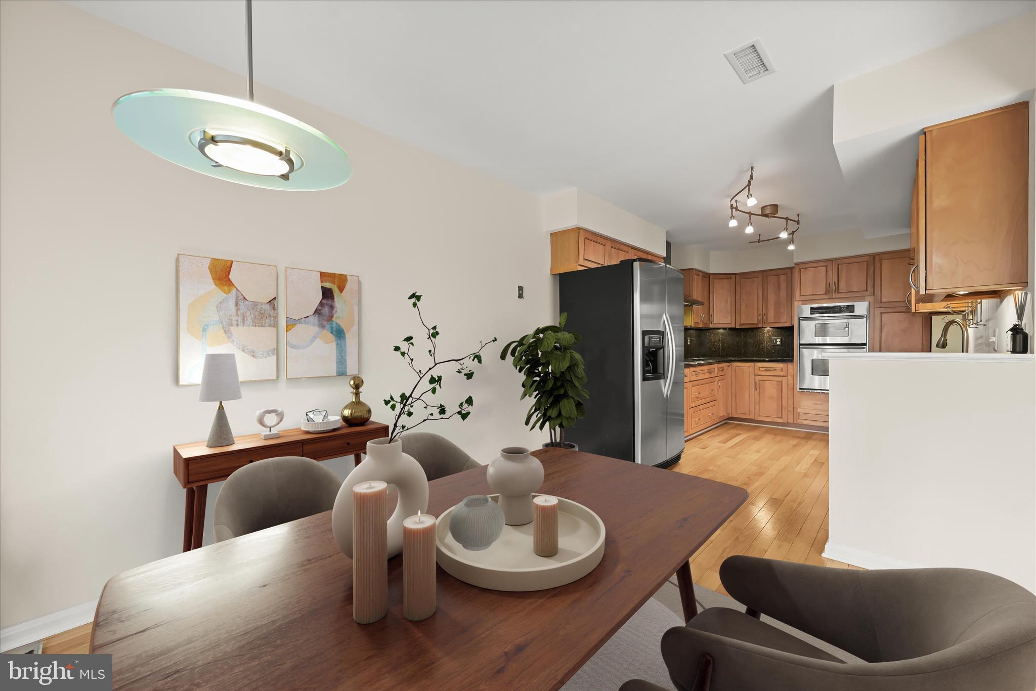 5153 Columbia Road, Unit 13 34 Columbia, MD 21044 - Photo 2 of 55 Kitchen with breakfast nook (virtually staged)