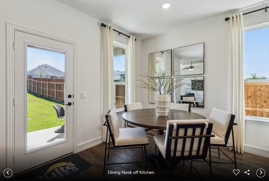16813 Bustillos Path Manor Manor, TX 78653 - Photo 7 of 15 a view of a dining room with furniture window and outside view
