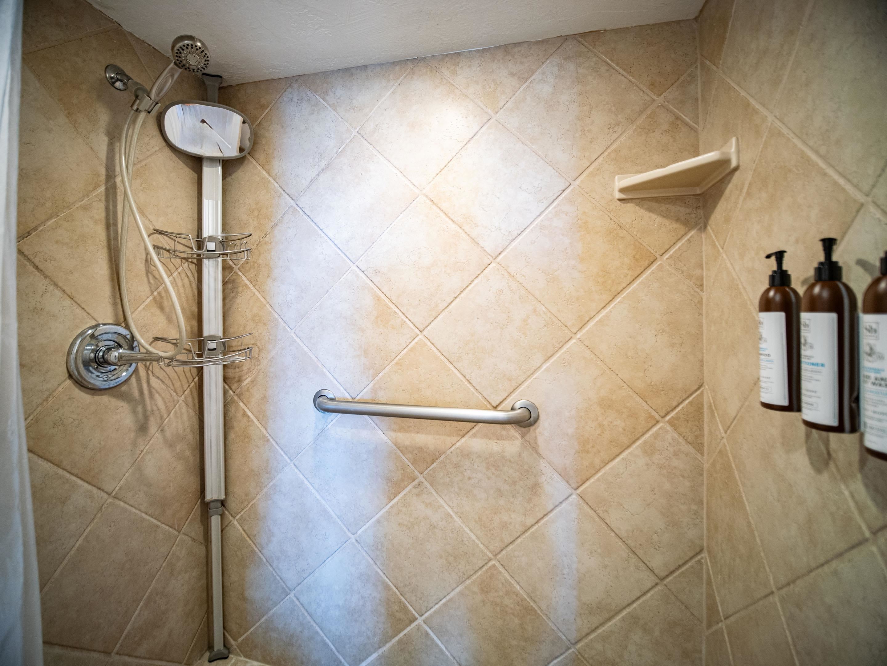 3723 Lower Honoapiilani Road, Unit 104 Lahaina, HI 96761 - Photo 13 of 45 a bathroom with a shower