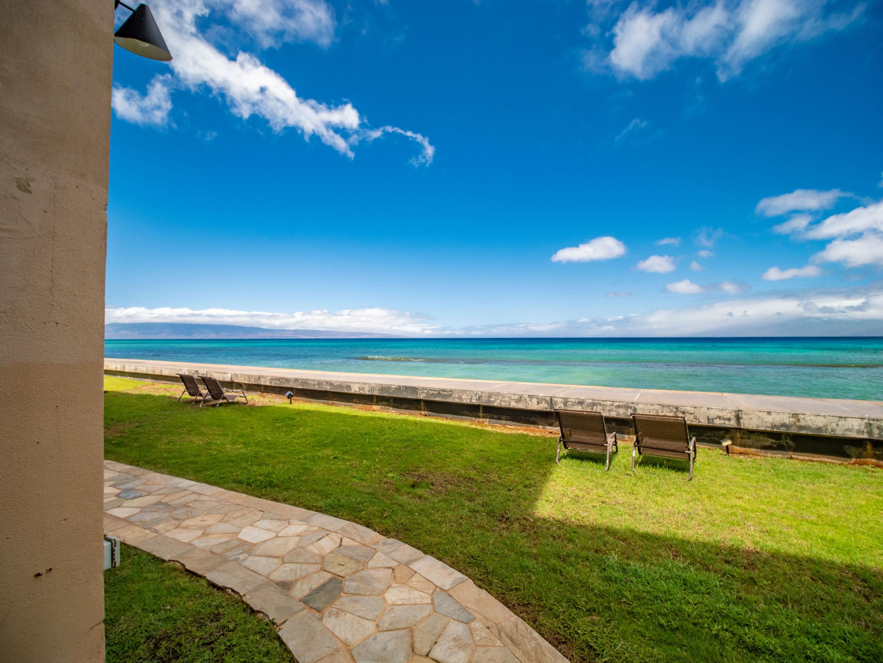 3723 Lower Honoapiilani Road, Unit 104 Lahaina, HI 96761 - Photo 21 of 45 a view of a swimming pool with a yard
