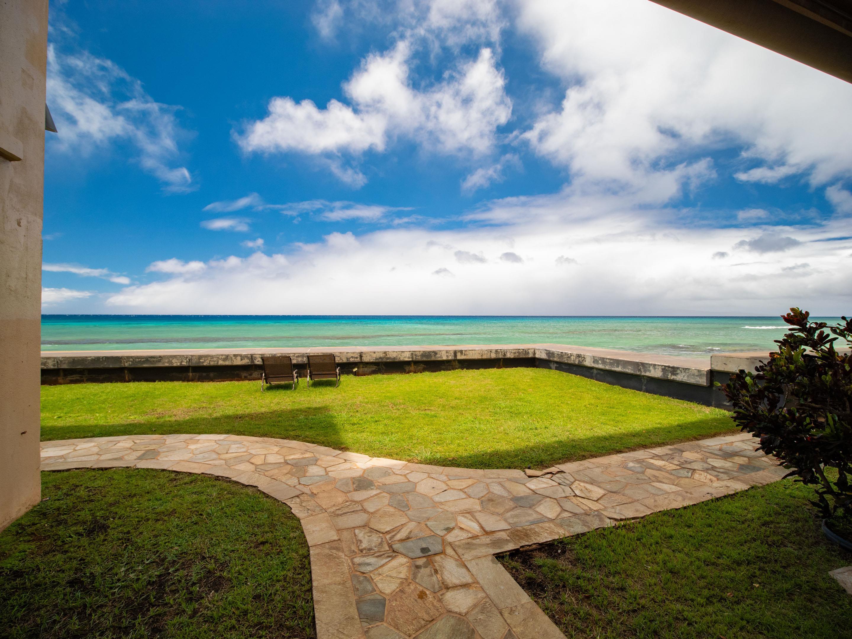 3723 Lower Honoapiilani Road, Unit 104 Lahaina, HI 96761 - Photo 33 of 45 a view of an swimming pool with a yard
