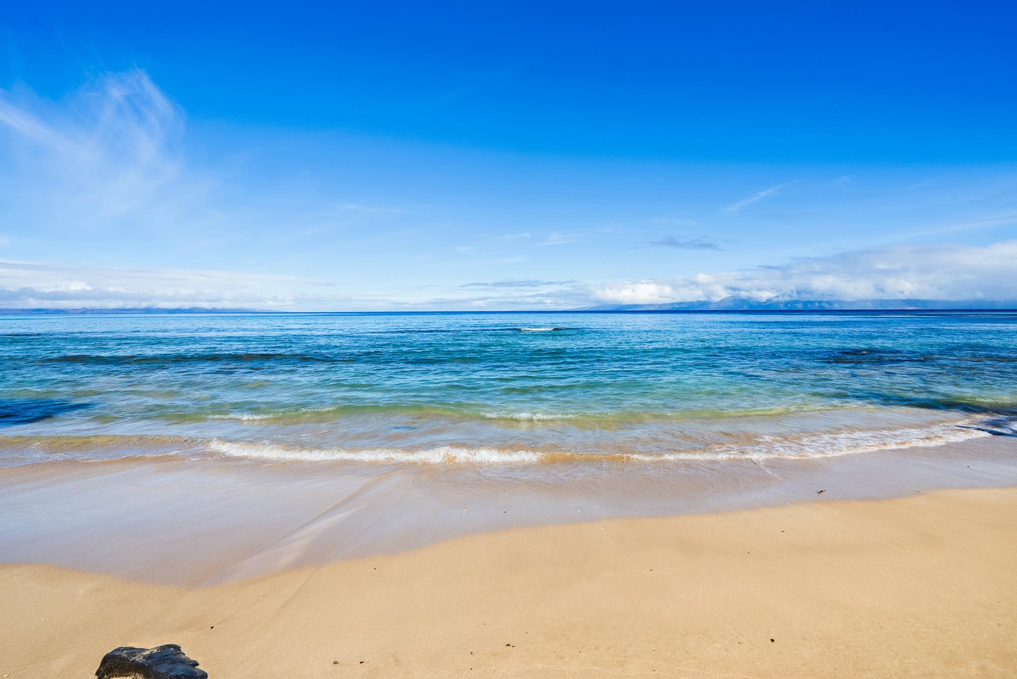 3723 Lower Honoapiilani Road, Unit 104 Lahaina, HI 96761 - Photo 39 of 45 a view of an ocean and beach