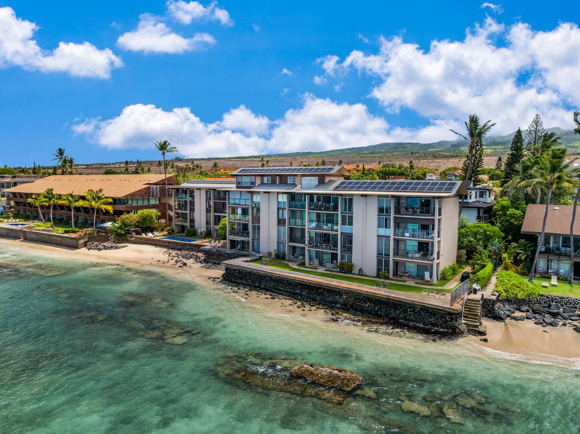 3723 Lower Honoapiilani Road, Unit 104 Lahaina, HI 96761 - Photo 42 of 45 a view of a house with a yard balcony and sitting area