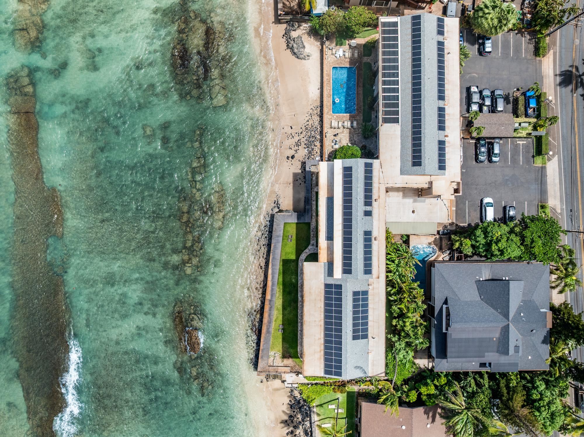 3723 Lower Honoapiilani Road, Unit 104 Lahaina, HI 96761 - Photo 43 of 45 aerial view of a multi story building