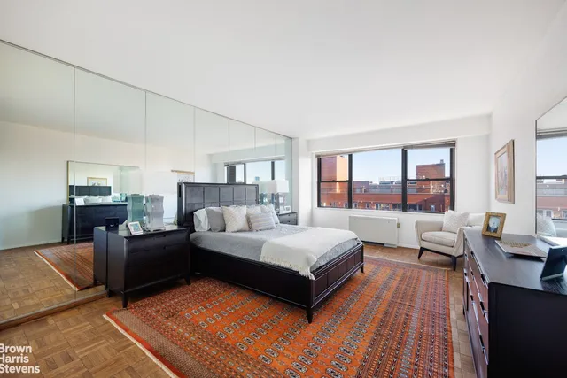 a kitchen with a stove a sink and a refrigerator