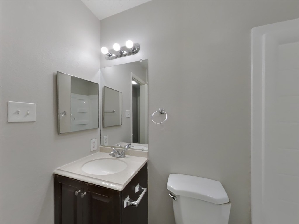 4227 Burkegate Drive Spring, TX 77373 - Photo 13 of 15 a bathroom with a sink toilet and mirror