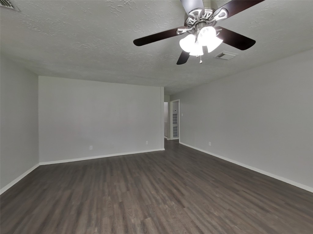 4227 Burkegate Drive Spring, TX 77373 - Photo 2 of 15 a view of an empty room with wooden floor