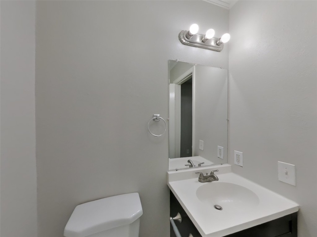 4227 Burkegate Drive Spring, TX 77373 - Photo 8 of 15 a bathroom with a toilet sink and mirror