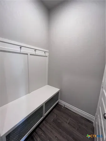 a hallway with a bed