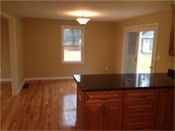 365 Pleasantdale Road Rutland, MA 01543 - Photo 4 of 11 a view of a livingroom with wooden floor and a window
