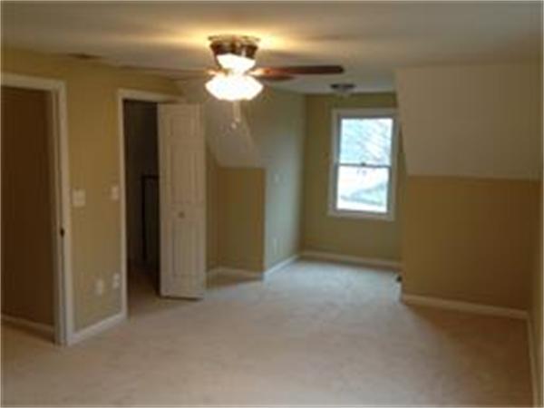 365 Pleasantdale Road Rutland, MA 01543 - Photo 7 of 11 wooden floor in an empty room with a window