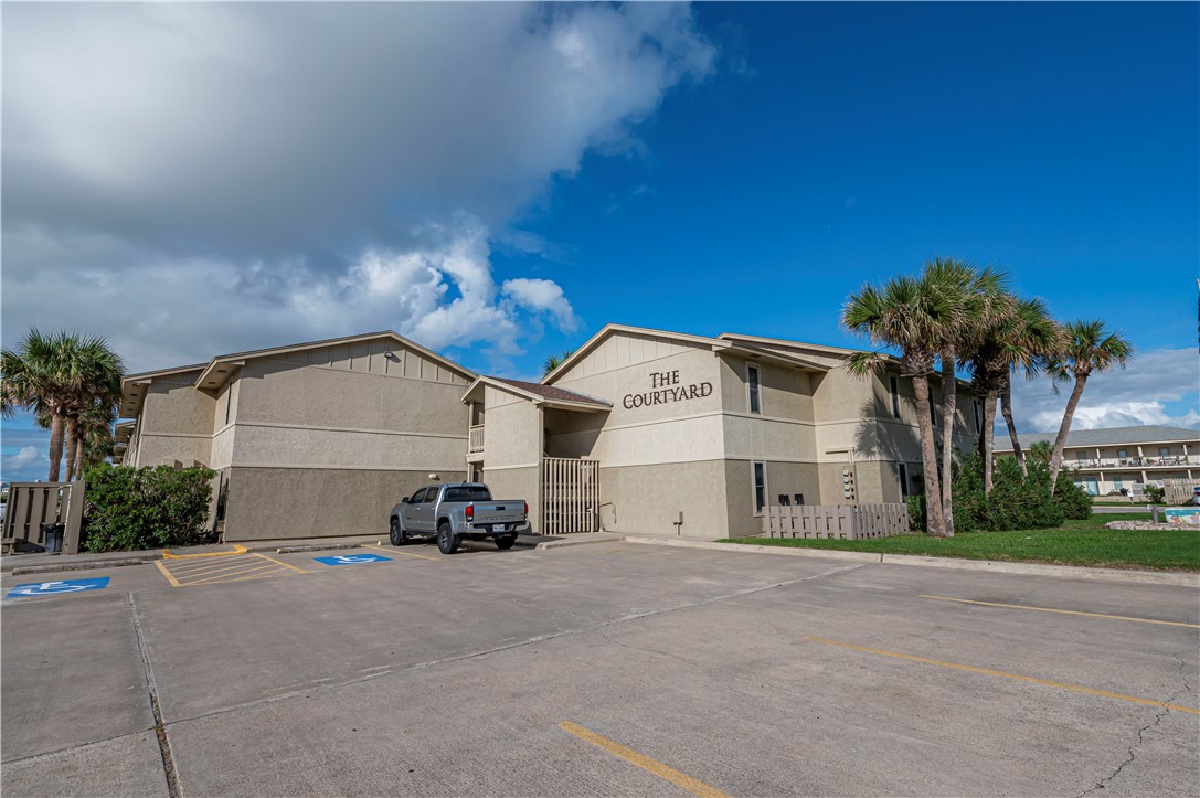 622 Beach Access Road Port Aransas, TX 78373 - Photo 2 of 19 a car parked in front of house