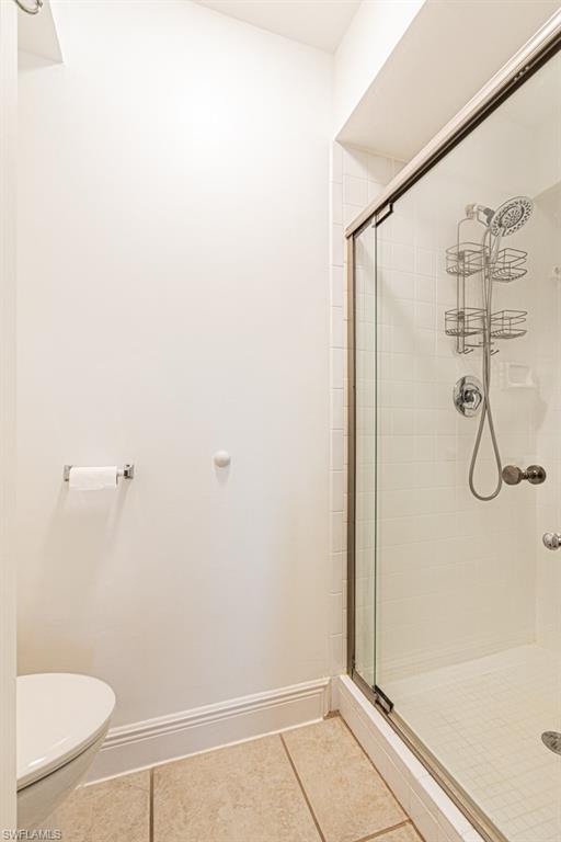 1850 West Crown Pointe Boulevard, Unit A202 Naples, FL 34112 - Photo 26 of 44 a bathroom with a shower