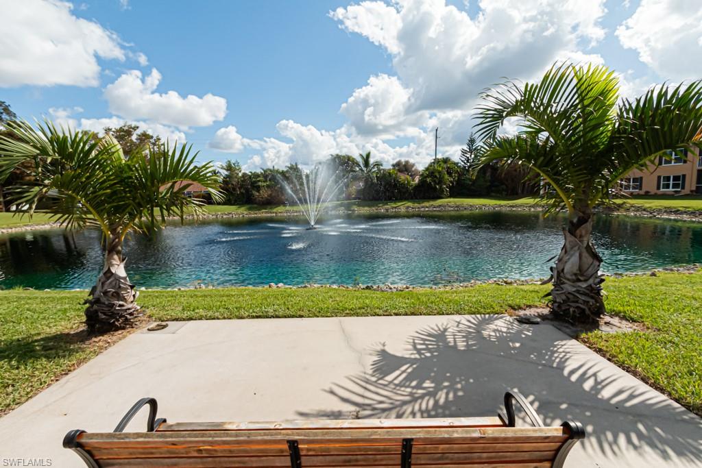 1850 West Crown Pointe Boulevard, Unit A202 Naples, FL 34112 - Photo 42 of 44 a view of a lake