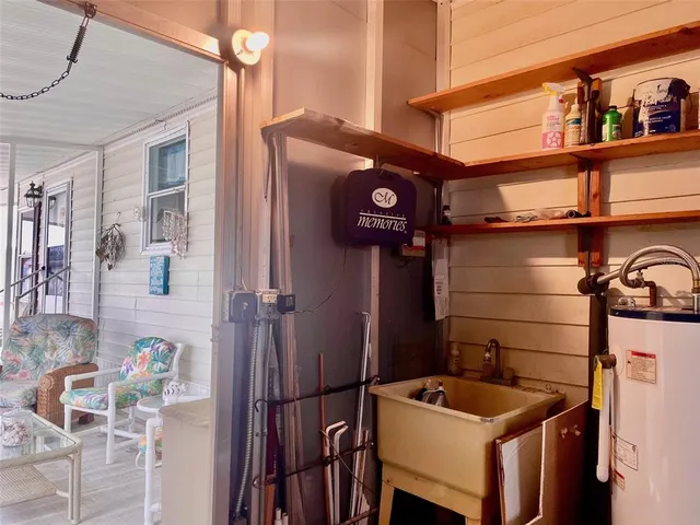 a view of a house with a yard and plants