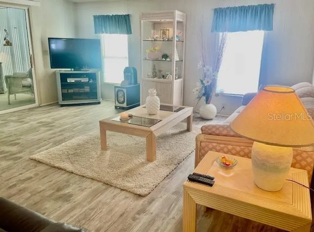 a living room with a couch and a flat screen tv