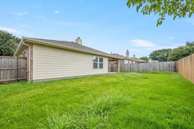 a view of outdoor space and yard