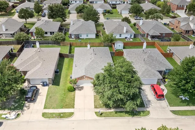 a picture of a room with a white wall and a picture