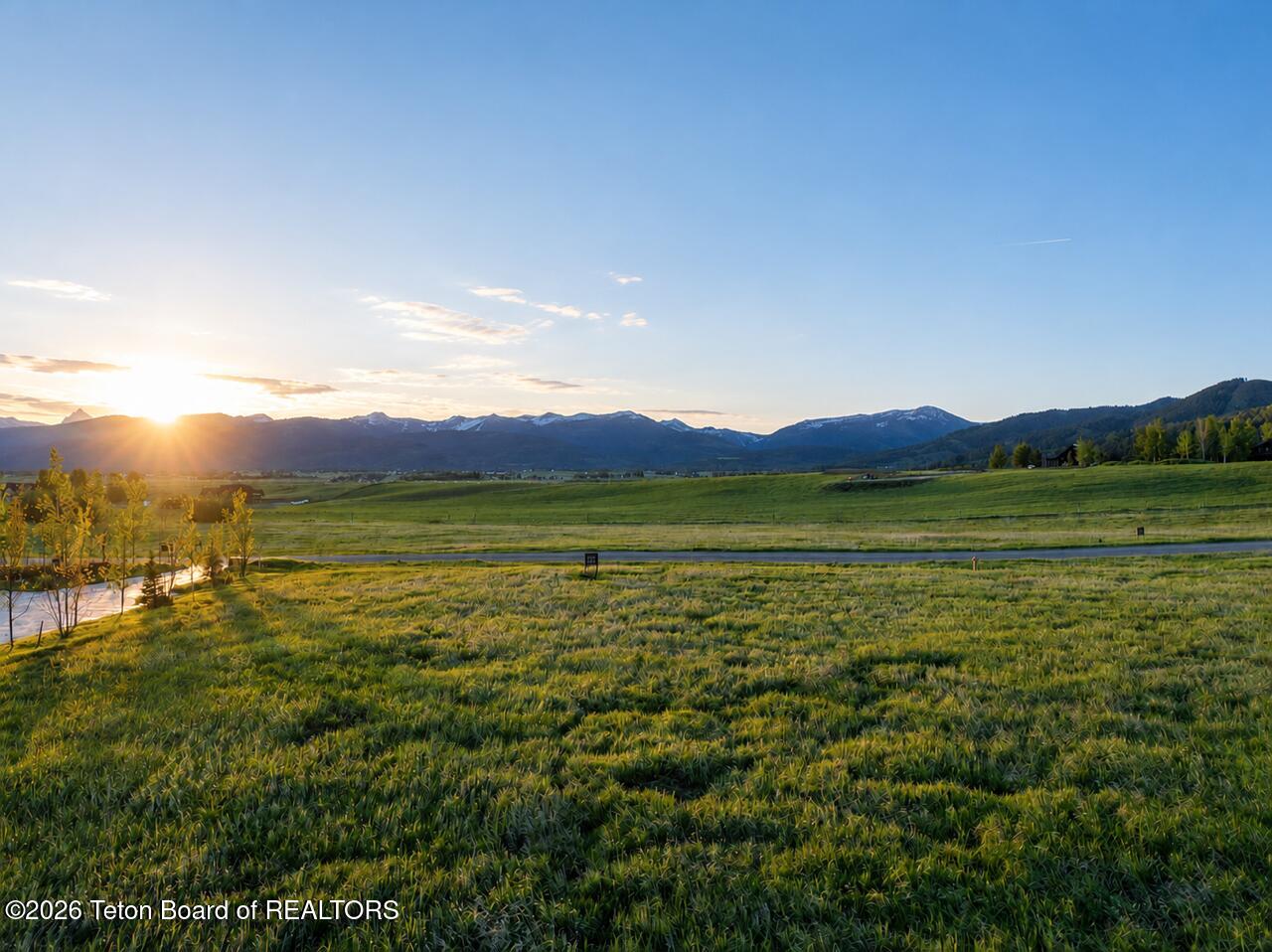 9830 Hiddenwaters Lane Victor, ID 83455 - Photo 2 of 22 Sunrise Photo (1)