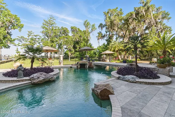 a view of swimming pool with a porch