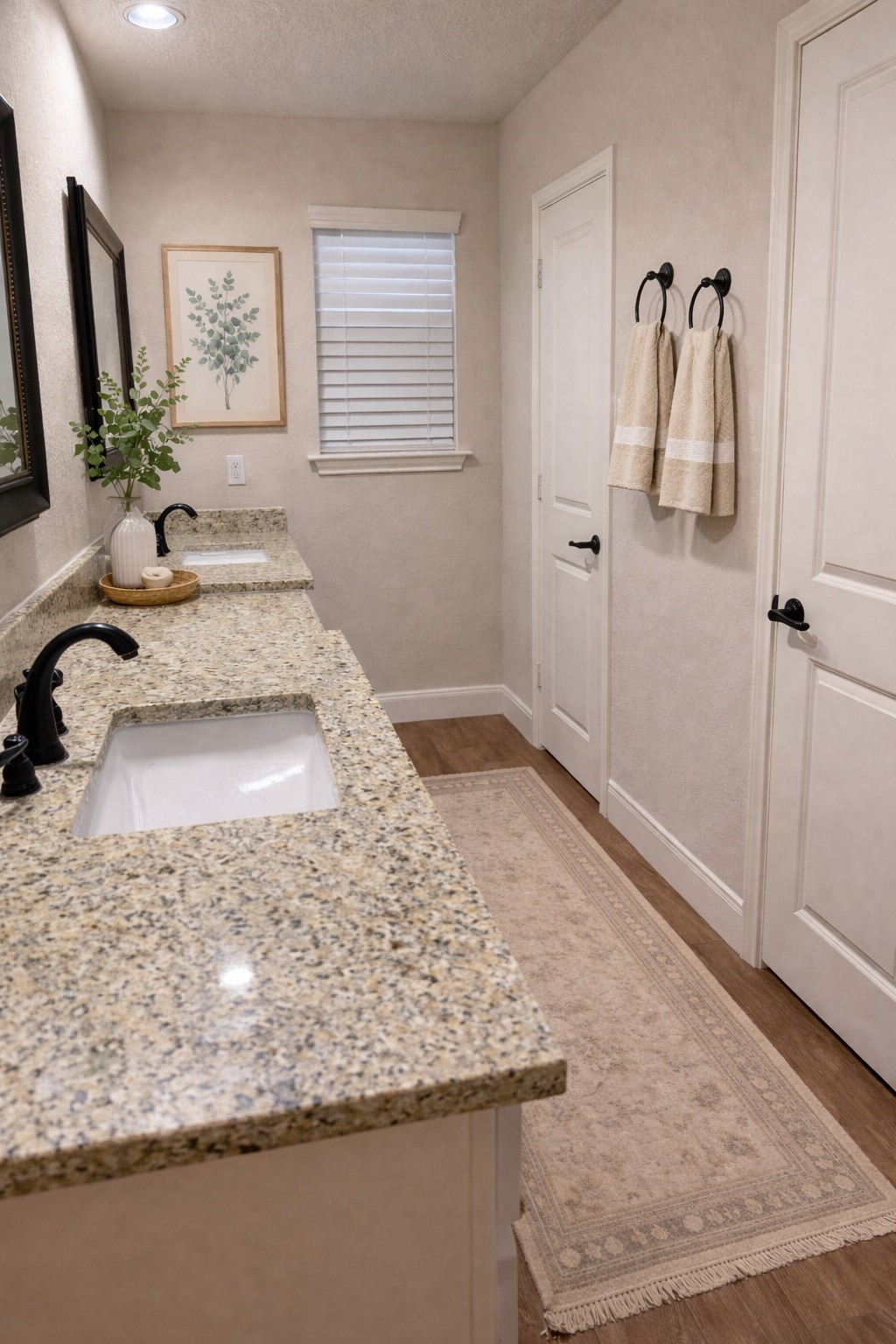 19103 Whitewood Drive Spring, TX 77373 - Photo 19 of 30 a bathroom with a granite countertop sink and a mirror