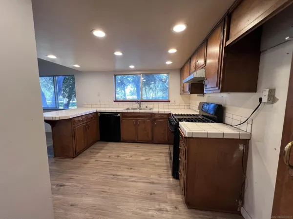 a bathroom with a bathtub and a toilet