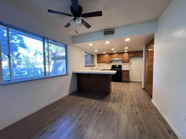 a view of a dining room with furniture
