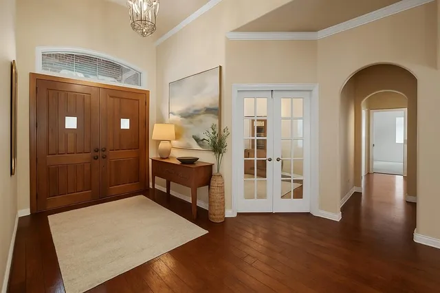 a view of a livingroom with furniture and wooden floor