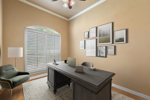 a view of a workspace with furniture