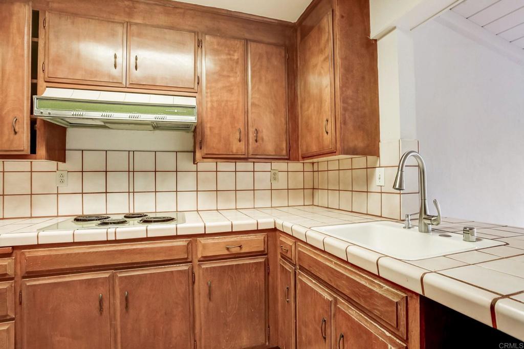 45 Springer Road Los Altos, CA 94024 - Photo 13 of 33 a sink with a sink and cabinets