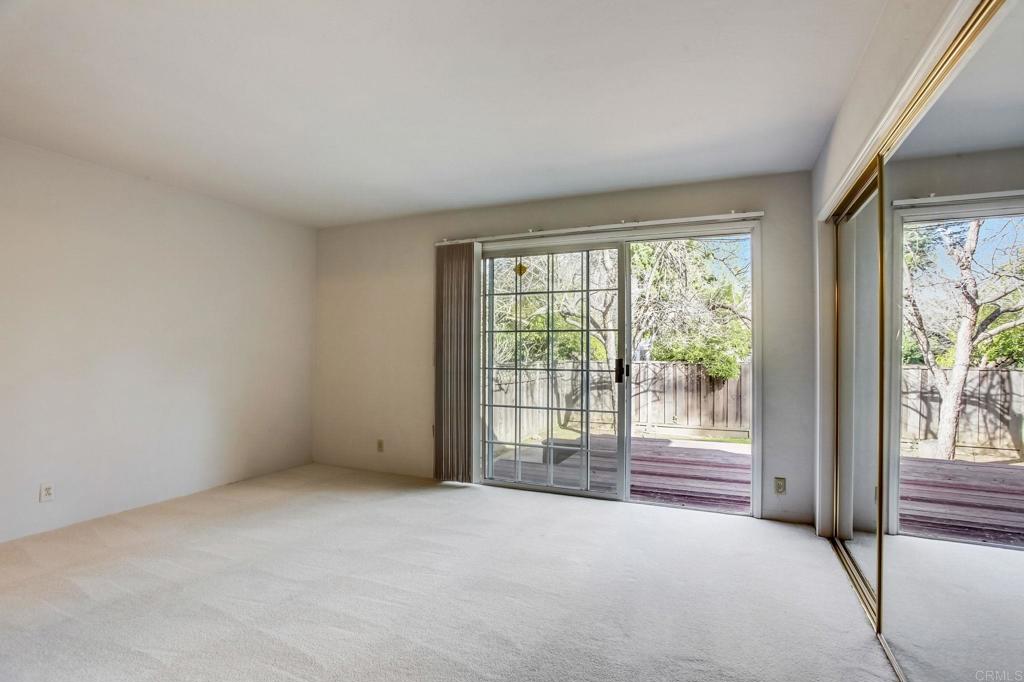 45 Springer Road Los Altos, CA 94024 - Photo 18 of 33 a view of an empty room with wooden floor and a window