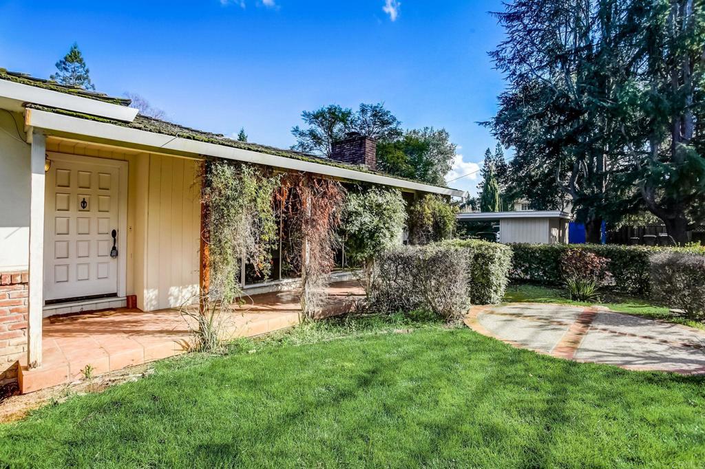 45 Springer Road Los Altos, CA 94024 - Photo 2 of 33 a backyard of a house with seating space