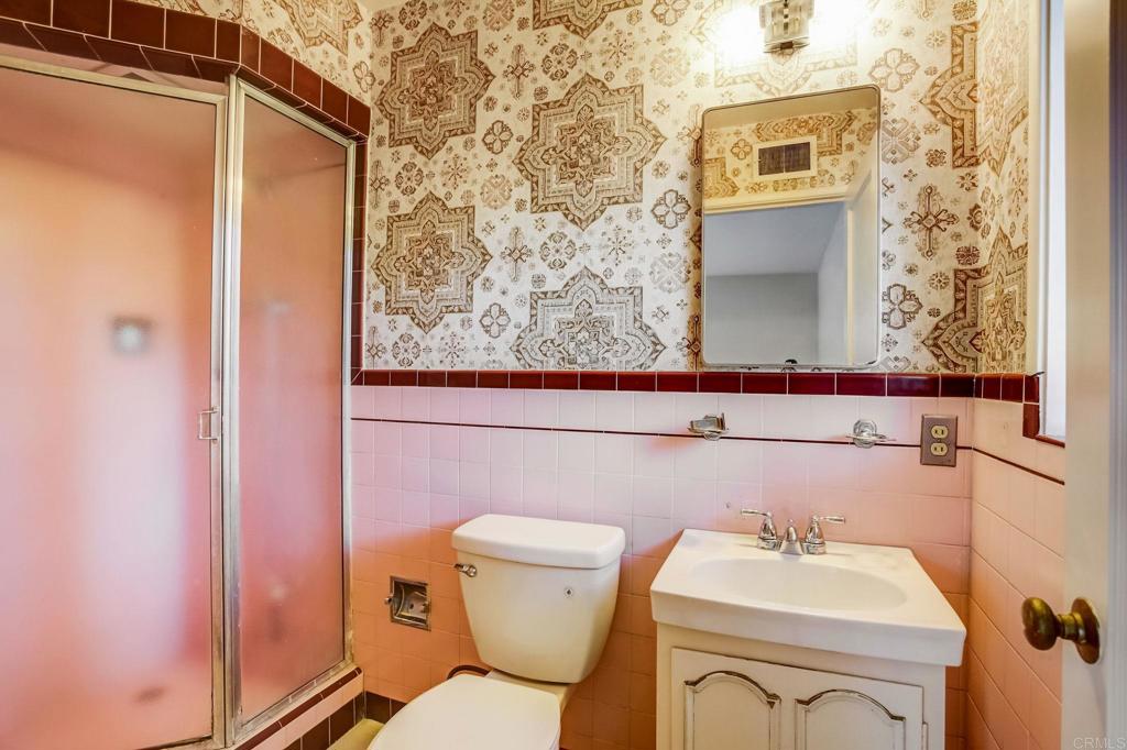 45 Springer Road Los Altos, CA 94024 - Photo 21 of 33 a bathroom with a sink toilet and shower