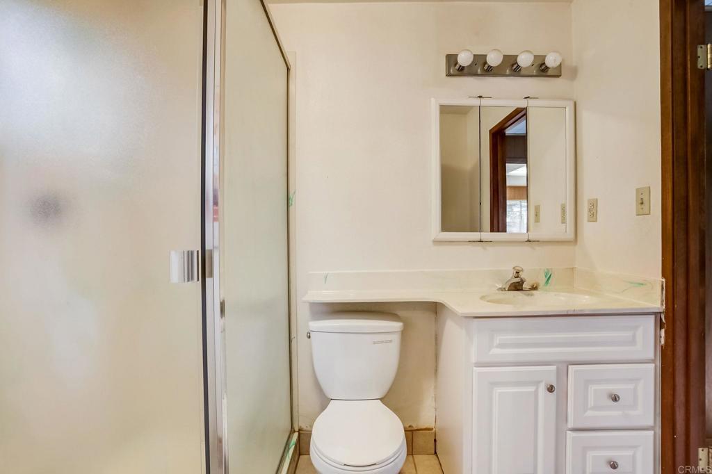 45 Springer Road Los Altos, CA 94024 - Photo 30 of 33 a bathroom with a toilet sink and mirror