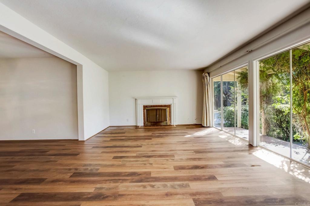 45 Springer Road Los Altos, CA 94024 - Photo 8 of 33 a view of an empty room with wooden floor and a window