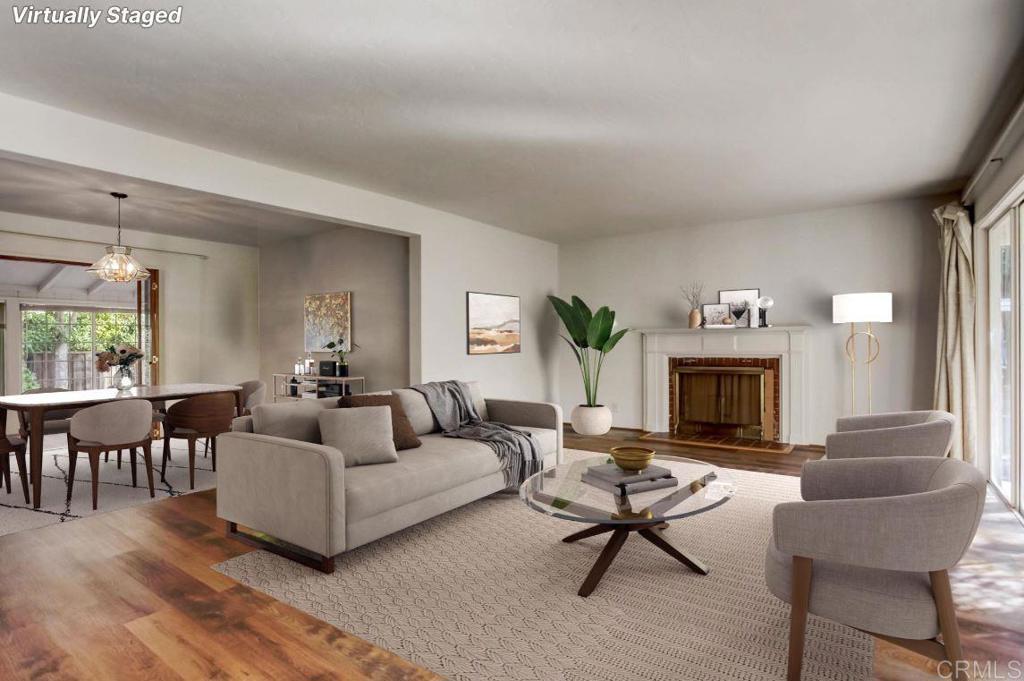 45 Springer Road Los Altos, CA 94024 - Photo 10 of 33 a living room with furniture a fireplace and a table