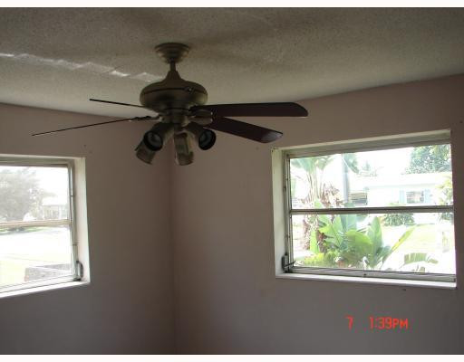 560 Southwest 50th Terrace Margate, FL 33068 - Photo 7 of 8 Master Bedroom