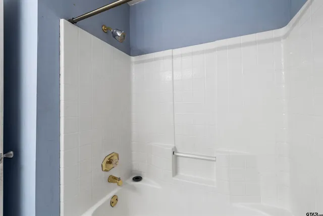 a bathroom with a bathtub