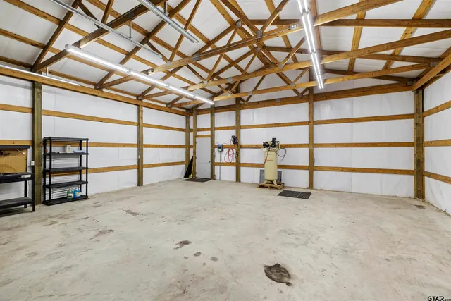 a view of a room with racks on the wall