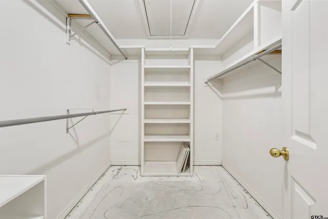 a view of an empty walk in closet