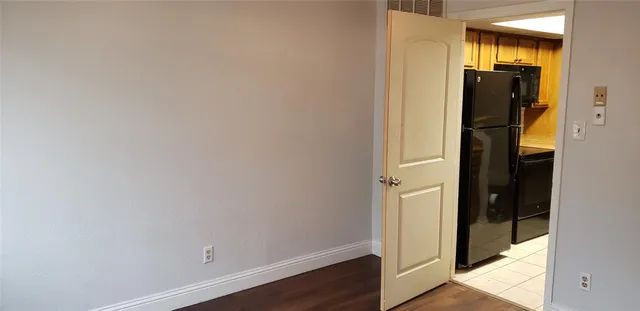 a view of a hallway with a closet