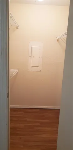 a view of small space with racks on the wall