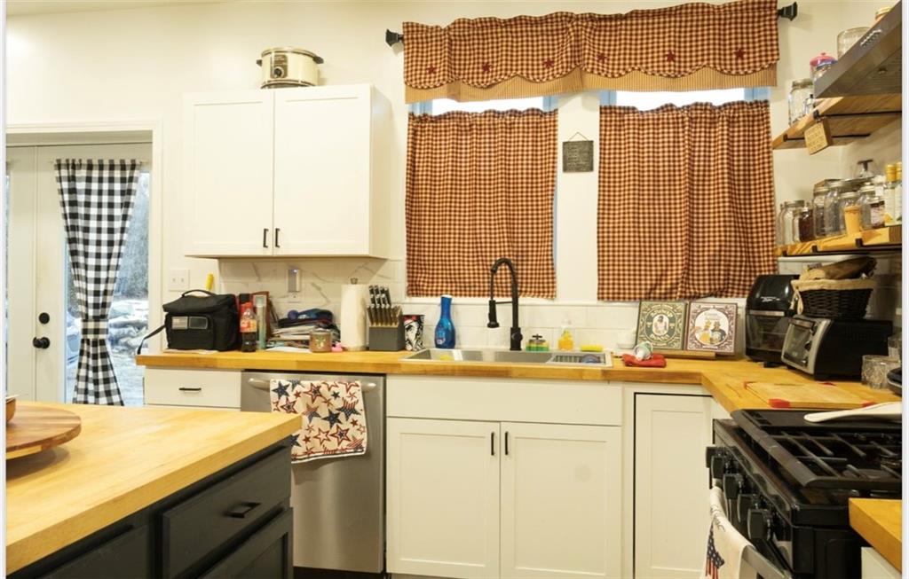 204 Pine Hill Road Kittanning, PA 16201 - Photo 12 of 23 a kitchen that has a sink and a stove in it